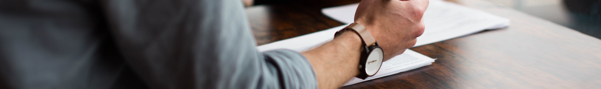 businessman viewing documents on a desk